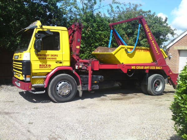 skip_hire_lorry_side_with_skip.jpg